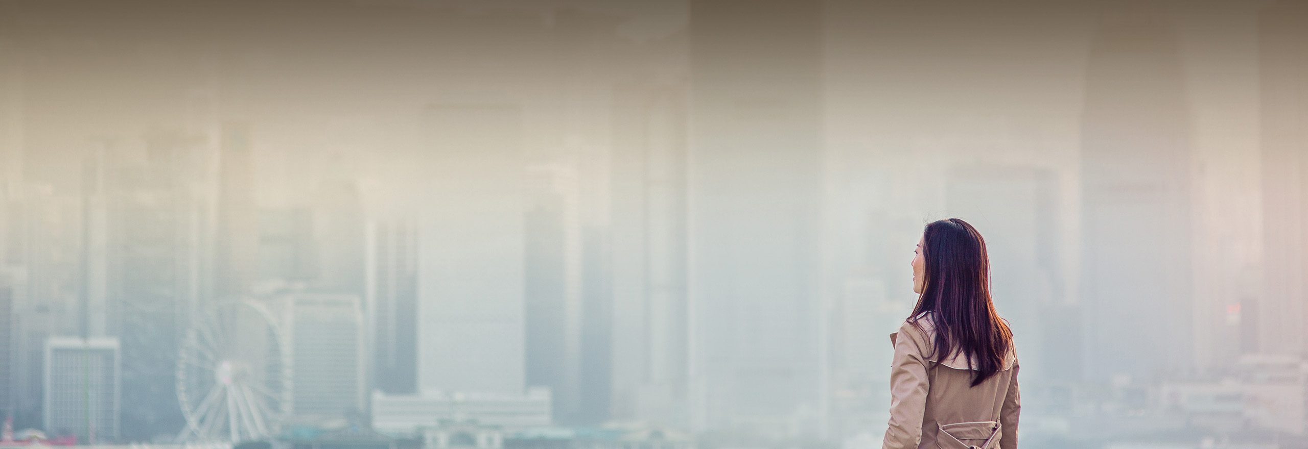 Woman overlooking and enjoying the great skyline